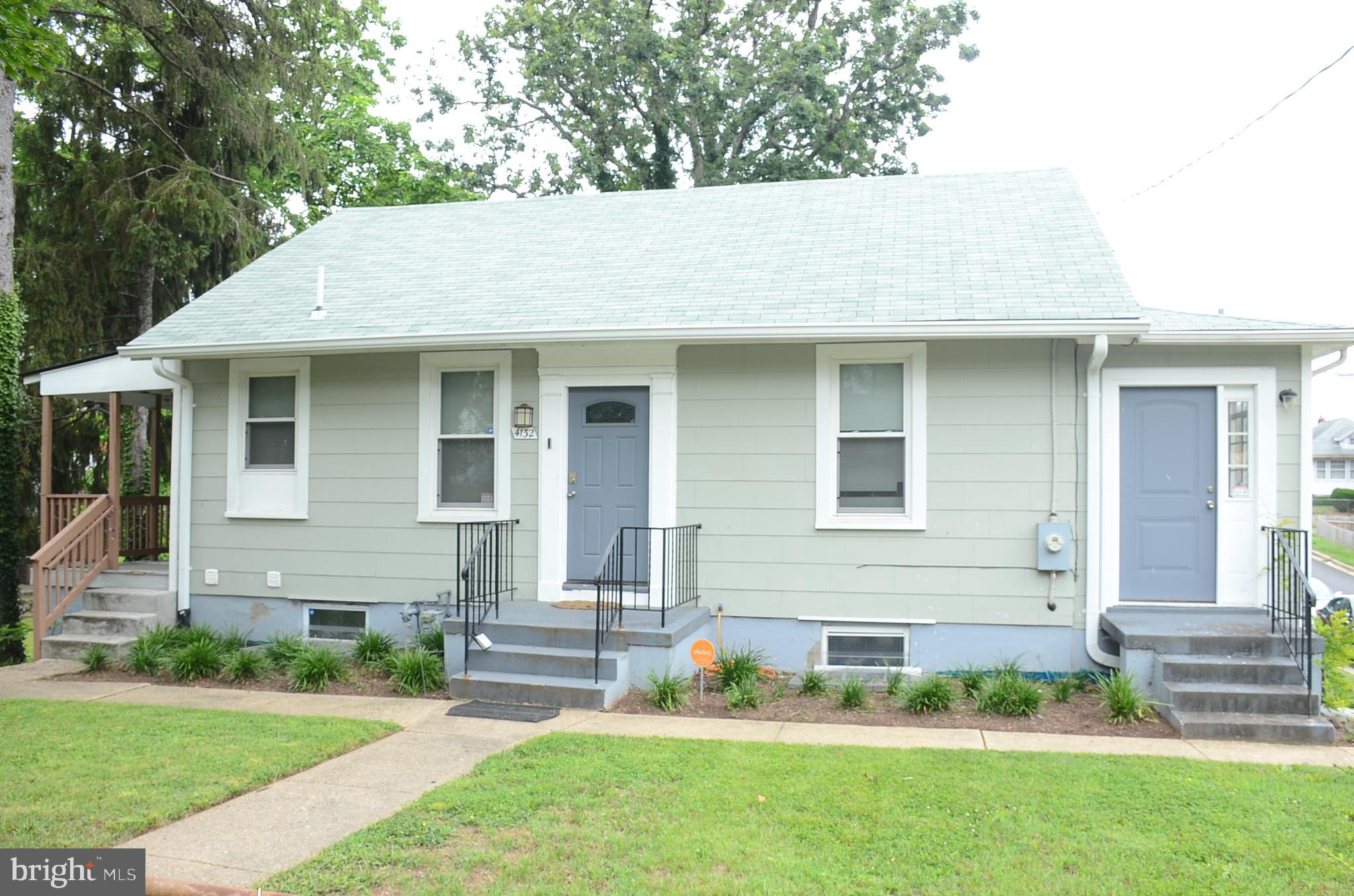 Come see this immaculate 4 bedroom 2 bathroom cape cod. This property was renovated in 2017 and remains in pristine condition. Enjoy the open floor plan which boasts a large kitchen equipped with stainless steel appliances and plenty of counter space, separate dining room area, and entry level bedroom. The upper-level bedroom has ample space with a sitting area. Venture downstairs into the fully finished basement which has 2 sizeable bedrooms with walk in closets or spend time in the rec room area. Relax on the porch overlooking the massive 10,000 square foot corner lot perfect for entertaining guests or immerse yourself in the natural light provided by your sunroom. You’ll also appreciate the short drive within 1 mile of Washington, DC. Driveway in the rear. This home has it all. Schedule an appointment to view today!