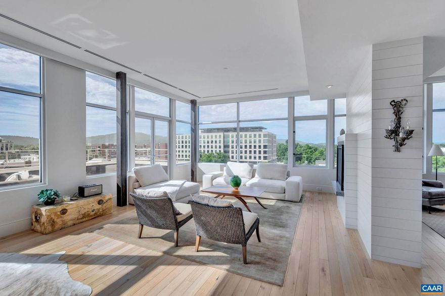 DOWNTOWN LUXURY LIVING // The Residences at 218 is Charlottesville?s premium upscale condominium featuring unsurpassed views of Downtown Charlottesville, Monticello, and the Blue Ridge Mountains; #604 offers the largest residential patio/balcony (760 SF) in the building. The property is located across the street from the CODE building and one block from Downtown Charlottesville's pedestrian Mall. Private entry building with two reserved parking spaces in the street level remote access gated Garage. The sunlight pours in from the floor to ceiling windows, and privacy is achieved in moments with the remote window treatments in each room. High end finishes throughout including premium appliances, lavish soaking tub, glass showers, luxurious walk-in closets - absolutely turn key as a primary or secondary residence. Enjoy the walkable community with quick access to dining, shopping, and all things UVA.,Soapstone Counter,Bus on City Route,Fireplace in Living Room