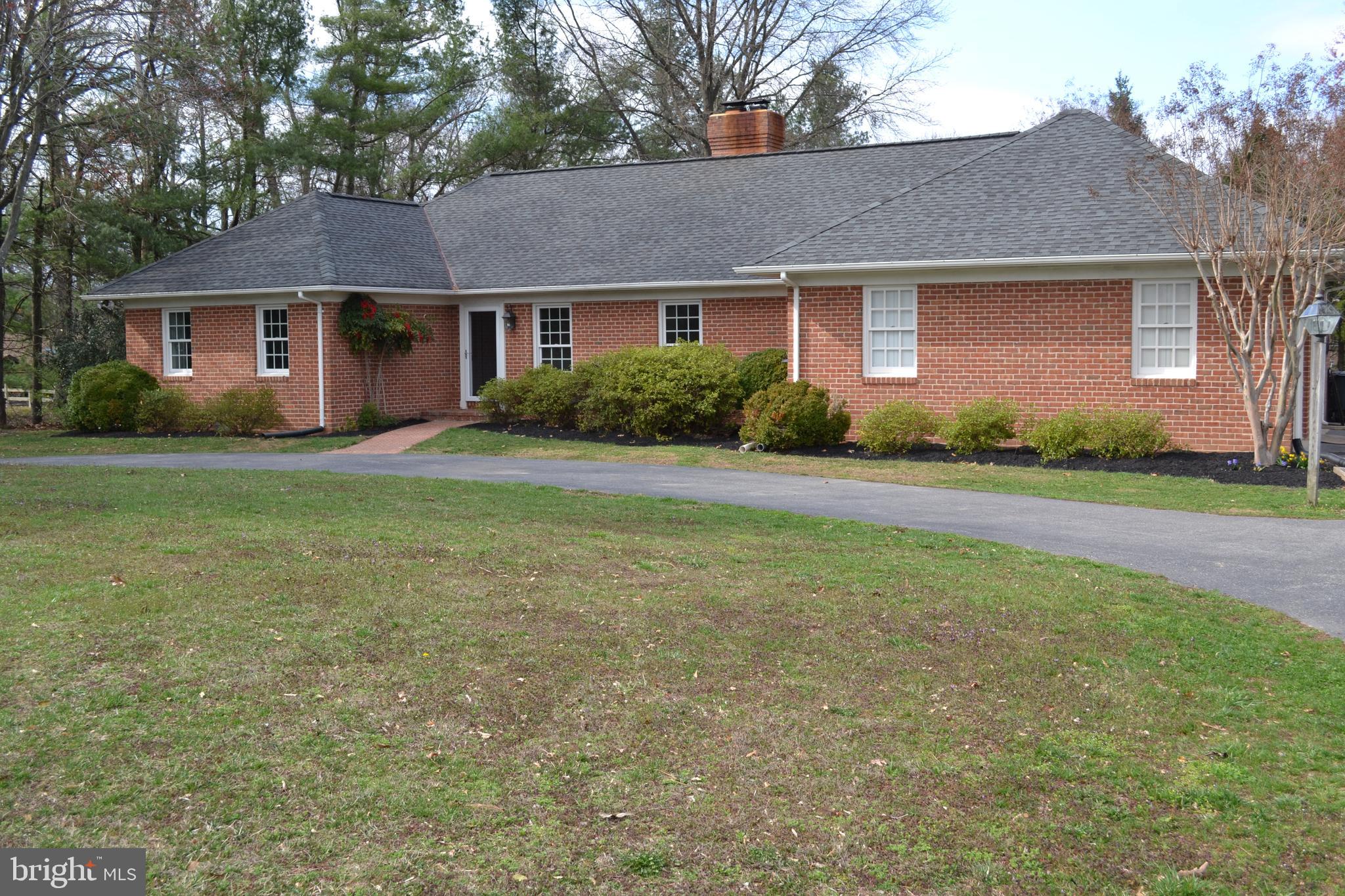 Lovely all brick rancher in Highland. 3 bedrooms, 2 full and 1 half bathrooms. In good condition featuring an exceptional floor plan with dual fireplaces, cathedral ceiling, rich hardwoods, large BR suites, family room, kitchen, 2-car garage and so much more! Minutes to Maple Lawn and Riverhill Amenities. Lawn mowing service included. 1 acre level lot.