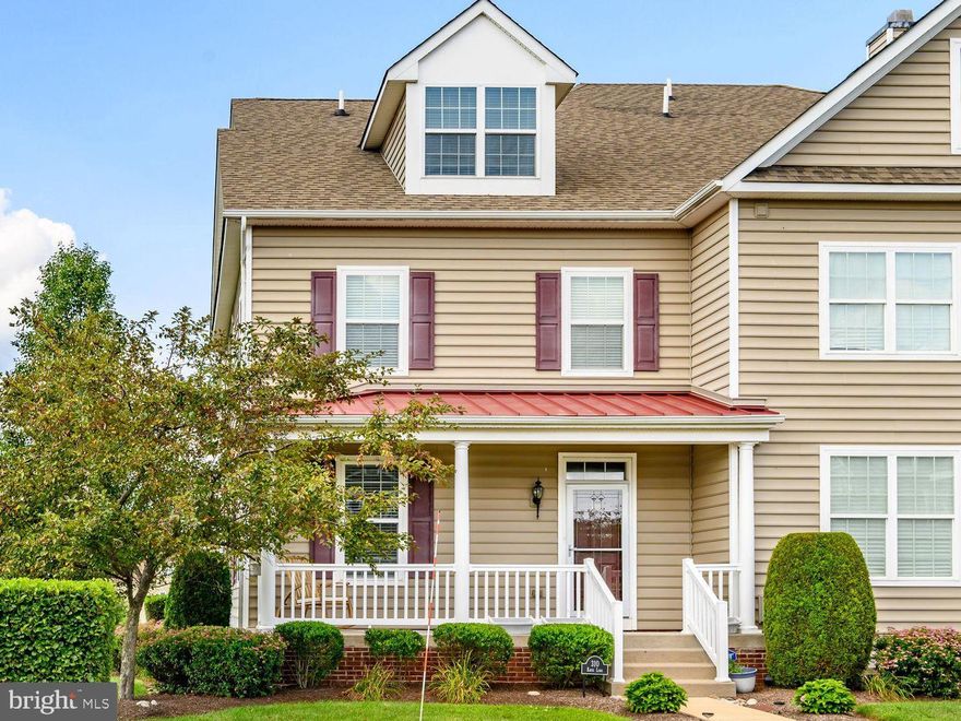 Bedminster Hunt offers the perfect blend of convenience and low maintenance living, ideally located within the Pennridge School District and just 15 minutes from Doylestown. Residents enjoy a walkable neighborhood setting with beautifully maintained surroundings and community gathering spaces.

This 3 bedroom, 2.5 bath end unit townhome welcomes you with a charming covered front porch, an inviting space to relax and unwind rain or shine. Step inside to a foyer that opens to the main living area, where 9 foot ceilings, hardwood flooring, and recessed lighting create a bright and welcoming atmosphere.

The open layout connects the living and dining areas to a well appointed kitchen featuring 42 inch cabinetry, granite countertops, stainless steel appliances, gas cooking, and a peninsula with bar seating ideal for everyday living or entertaining. A generously sized pantry provides additional storage, and a powder room completes the main level.

The second level includes two bedrooms and two full bathrooms. The primary suite offers two walk in closets and a private bath with a glass enclosed walk in shower. The third bedroom occupies the entire top floor offering flexible space for a bedroom, office, or bonus retreat.

The finished lower level adds approximately 275 square feet of additional living space, perfect for a media room, gym, or play area, along with extra storage and a dedicated laundry area.

Residents enjoy walking paths throughout the neighborhood, along with a playground, tennis court, and basketball court, creating an easy and active lifestyle in a prime Bucks County location.