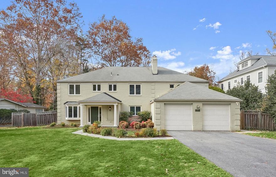 This classic brick Colonial was masterfully redesigned and expanded in 2006, offering more than 6,500 square feet of beautifully renovated living space, complete with a two-car garage and EV charger. Sited on a rare and private ¾-acre lot (33,238 square feet), the deep, level, fenced backyard provides an exceptional
setting for both everyday living and entertaining. The outdoor spaces truly set this home apart. Enjoy morning coffee or weekend reading on the vaulted screened porch as the gentle sounds of the pond creates a peaceful backdrop, or practice your short game on your own private putting green. Inside, a gracious
front entry draws your eye through the sun-filled interior, reimagined for today’s lifestyle. The chef’s kitchen features high-end stainless-steel appliances and opens seamlessly to a step-down family room anchored by a striking double-sided wood-burning fireplace. The primary suite addition is a true retreat, with vaulted
ceilings, private sitting room, custom walk-in closet with abundant built-ins, and a spa-inspired bath featuring dual vanities, soaking tub, and multi-head shower. A main-level bedroom suite offers flexibility for guests, while additional spaces easily accommodate offices and gathering areas. Freshly painted throughout with many recent upgrades 

Located within the popular and highly coveted Walt Whitman High School cluster, this exceptional home blends timeless architecture and modern comfort for an unparalleled lifestyle.