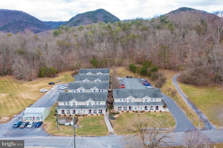 Located at 2754 Maple Avenue, Buena Vista, VA 24416, the River Crossing Apartments are fully furnished student housing next to Southern Virginia University (SVU). The properties are considered “on campus” housing approved by SVU. Twenty 2 story townhouses with 2 bedrooms, 1.5 bath and approximately 1,000 sf. Each unit is fully furnished with washer/dryer and furniture such as beds, dressers, couch, chair/ottoman, end tables, dining table/4 chairs, desk, etc. Five buildings are constructed with Hardie Plank cement board siding, a composition shingle roof, steel framing, and concrete slab on approximately 1.67 acres. The buildings were constructed in 2007 and have been well maintained by the same owner. Other improvements include updated HVACs, water heaters, appliances, an asphalt paved private/assigned parking lot, concrete sidewalks and security lighting. Conversion of bedding from traditional box spring/mattress to platform/memory foam. Approximately 1-acre adjacent lot would be available for sale at $150K with the apartments sale. Owner financing available for a qualified buyer.