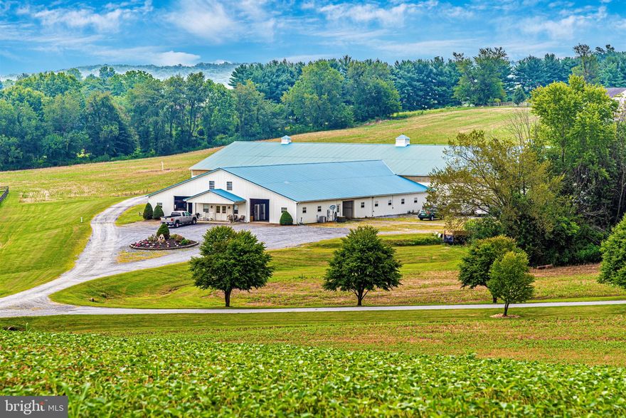 TURNKEY! Designed by a professional equestrian for the serious equestrian client, there is no detail missed!  Originally known as Cradlepine Ranch and home to a thriving, champion Quarter Horse operation, this thoughtfully designed 67 acre facility can be easily adapted for any breed or any sport. Similar facilities in the mid-Atlantic can generate over $500,000 a year in revenue, with good a business plan and good management. 27 stall, state-of-the-art 76  x 120  barn with attached 80 x200  indoor arena has all the bells and whistles, including, heated observation lounge, bathroom, 2 wash stalls with hot water, 950 sq ft 2nd floor main office with kitchenette and bathroom, 1st level reception office/foyer, trainers office, lab, and 3 or 4 tack areas/rooms, plus designated areas for equipment, feed, hay, bedding, manure storage and more. Outside features a 150 x300  all-weather footing arena, multiple turnout pastures with board fencing and run-in sheds, plus variety of storage and machine sheds and hay fields.  Facility layout is both  labor friendly  as well as  big rig  friendly, with ample turnarounds   not to mention plenty client parking! Property also includes tenant house with 3 separate living spaces allowing for privacy. Located in the heart of Maryland horse country and craft beverage territory, western Frederick County offers what is said to be the state s finest soil for pastures for raising foals, grapes or hops, this property and its numerous outbuildings could easily convert for a winery, farm brewery, show cattle   or just about any other ag enterprise.Primary dwelling is set on peak overlooking the property, enabling the owner to at all times see everyone on the farm, while clever placement and landscaping around tenant house ensures main house privacy. Designed and built by a customer builder for his own family, this 5,700+ square foot all-brick home features breathtaking panoramic mountain and valley views, hardwood floors throughout, a spacious kitchen/great room with large center island, custom maple cabinets, floor to ceiling windows and wood burning fireplace; 3+ bedrooms, 4 bathrooms, including a spacious master suite with sitting room/bonus room and master bath with luxurious soaking tub; full walk-out basement with rough-ins, ready for your customization, plus a mudroom (of course) and a 3 car garage. For someone seeking one-level living, the first floor office could easily convert into a master suite. Must see to appreciate   schedule a tour today!