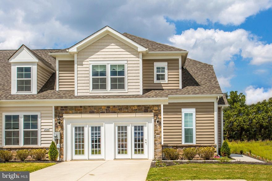 FINAL OPPORTUNITY!!! BRAND NEW CONSTRUCTION MOVE-IN SPRING 2022! JOIN THE NEW ROSEWOOD VILLAGE COMMUNITY  TODAY! This gorgeous 2 level villa with a double car garage.   Main floor living with open floorplan , entry level master bedroom with a total 4 bedrooms and 2.5 baths, plus an electric fireplace. Backs up to the tree-line. Spacious and shows like a single family home with large bedroom sizes. Photos may be of similar home/floorplan if home is under construction or if this is a base price listing.