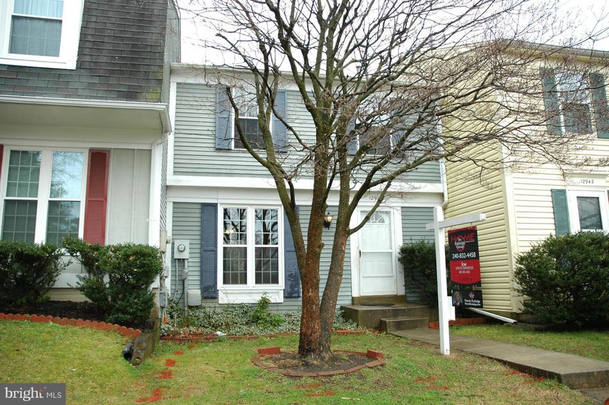 Great townhome with lots of potential.  Just waiting for the right buyer to add their personal finishing touches.  Pergo flooring featured on entire main level.  Family room, dining room, and kitchen with breakfast bar featured on main level.  Upstairs features 3 bedrooms and 1 full bath.  Lower level features a spacious recreation room and full bath.  Subject to third party approval.