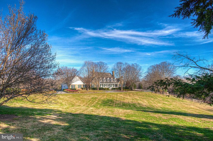 **MAJOR PRICE ADJUSTMENT**In the frenzy of modern hustle, it's rare to find  a piece of the world where time stands still, and the heart finds home. Enter Evermore Farm: an equestrian estate where champions live.  Evermore Farm presents a unique experience born from it's close-in location in Darnestown, just outside Potomac, Maryland and a short commute to downtown Washington, DC and a tireless journey for architectural excellence.  For the first time ever, Evermore Farm is now available to qualified purchasers.  Comprising twenty awe-inspiring acres, a  stone manor home (newly constructed in 1997 by Storybook Homes),  a circa 1817 two-apartment guest house, world class equestrian facilities, a detached trailer and tractor garage with hay storage, rolling fields, pastures and paddocks, a spring fed pond with fountain, exquisitely landscaped patios and terraces and much more.  Evermore Farms perfectly blends site and structure to evoke a lasting sense of wonder.   The main stone manor house is an achievement in style and design .  Upon entry through the foyer, your eyes will admire and obsess over the sumptuous interiors and sweeping views from virtually every window and room.  Formal dining graces the hall to the left, and a lavishly handsome parlor spans the middle of the residence.  The grand kitchen with top-of-the-line appliances and surfaces can easily support large-scale entertaining, while remaining intimate enough for a quaint dinner-for two.  Adjacent to the kitchen is the morning room, few spaces offer such casual refined luxury for relaxation and merriment.  An added convenience, the main level provides for stair free living, with the owners suite occupying the easternmost wing of the structure, with dual baths  & closets and separate sitting  room.  The executive library sports rich textures and artfully crafted built-ins in a setting that exemplifies comfort and refinement.  The main level is finished with two powder rooms, a convenient house managers office, a puppy spa, and attached garage for three leading to the motor court.The upper level provides a private retreat for three secondary bedrooms with adjoining salon and seating area.  The lower level features a center for wellness, a guest suite or staff quarters and ample storage. Across the footbridge is the equestrian center:  an indoor arena with rain-misters to dampen the footing, seven stall (Lucas system) barn including a wash stall with heated ceiling, air-conditioned tack-room and feed room, utility room and laundry , dutch doors & sliders, all-season heated waterers, outdoor arena & paddocks and more.At the base of the property rests the guest house, proudly in place since 1817.  The original wood floors will still support your visitors today, with original wood-burning fireplaces, three bedrooms (currently configures into two independent apartments) separate well and septic systems, dual kitchens and generator.   Indulge your passion for exquisite country living just outside the city, this is Evermore Farm.
