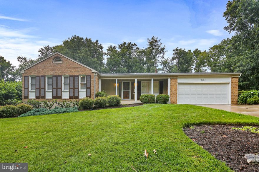 Totally gorgeous move-in ready rancher! Convenient one level living with new carpet, fresh paint, updated bathrooms, new granite countertops! New light fixtures, updated outlets and blinds! Huge rooms offer lots of living space,  including a living room, dining room, and family room with shelves and sliding glass doors to the gorgeous paver patio. Nice landscaping and a spacious almost half acre yard in the heart of Columbia!  Replacement windows! Big two car garage! All this with a mostly finished basement boasting living space, tons of storage, and a workroom!