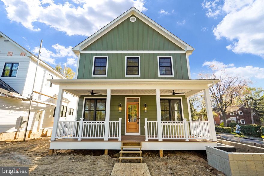 ***HARDSCAPE AND LANDSCAPE TO BE COMPLETED IN 2-3 WEEKS*** Welcome to your dream modern home in the highly sought-after Oakcrest community of Arlington! This newly constructed gem is perfectly situated on a premium corner lot, offering privacy and space for your family's needs. As you enter, you'll be immediately captivated by the open floor plan, high ceilings, and walls of windows that bathe the home in natural light. Custom paint throughout and crown molding add a touch of sophistication, while the white oak hardwood floors exude warmth and elegance. The heart of this home is the stunning chef gourmet kitchen that's sure to inspire your culinary endeavors. Featuring a huge waterfall island with breakfast bar, custom pendant lighting, and quartz countertops, this kitchen is a true masterpiece. The classic square tile backsplash, linen and maple rye cabinets with brush gold hardware, and black frame windows add a modern and chic touch. The kitchen is equipped with top-of-the-line stainless steel appliances, including a commercial gas range, range hood, pot filler, dishwasher, microwave, wine cooler, and refrigerator framed with custom built-in cabinetry for a pantry. Adjacent to the kitchen, you'll find a separate dining area and a cozy family area, perfect for gatherings and entertaining. Through the glass French doors, a rear deck awaits, offering a serene outdoor space for relaxation and enjoyment. The upper level of the home boasts a luxurious primary suite, complete with high ceilings, recessed lights, ceiling fan, and speakers for a truly elevated experience. The his and her closets provide ample storage space, and the ensuite luxury bath features a double sink vanity, shower, and a soak bath for ultimate relaxation. Additionally, the upper level includes a convenient laundry room with a full-size front load washer and dryer, as well as three more generously sized bedrooms, each with its own lavish full-bath. The fully finished walk-out lower level is an entertainer's delight, with a spacious recreation area and a large wet-bar that's perfect for hosting guests. A bedroom with a full-bath offers privacy and convenience for overnight guests or extended family. This modern home also comes equipped with a Sonos system, recessed lighting, and custom features throughout, adding to its contemporary appeal. The two-car side load garage provides ample space for parking and storage. Located in the popular Oakcrest community of Arlington, this home offers a convenient and desirable lifestyle, with easy access to amenities, parks, and schools. A commuter's dream with the bus stop (direct shot to Pentagon/Pentagon Metro Stop). Approximately 10-15-minute drive to downtown DC, National Landing, Pentagon City, Crystal City, the Pentagon and Old Town Alexandria. Enjoy the bike/running trails that are nearby, including Four Mile Run connecting to the Mt. Vernon trail along the Potomac. Just stop lights away from I-395N and a few miles to GW Parkway. Walk to Starbucks, grocery stores, gym, tennis courts (arcoss the street) and the Sunday morning Farmer’s Market. Don't miss this opportunity to make this modern masterpiece your own and experience luxurious and comfortable living at its finest!