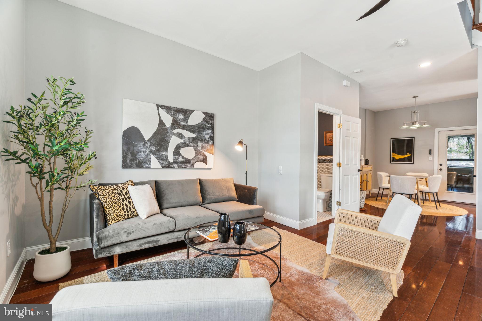 Welcome to 901 N 5th Street, a stunning 4-bedroom, 3.5-bath corner townhome in the heart of Northern Liberties. This beautiful home offers over 2,300 square feet of luxurious living space, featuring all new Pella windows, multiple outdoor decks that offer 360 degree views of this amazing city, soaring 10-foot ceilings, Brazilian hardwood floors throughout, and freshly painted interior. The modern kitchen is equipped with stainless steel appliances, granite countertops, plenty of cabinet space and recessed lighting. A striking three-story staircase and gas fireplace adds elegance to the home's living space, and dual-zoned heating and central air ensure year-round comfort.
Designed for both style and function, this home includes a dedicated laundry closet, finished basement, and private garaged parking. Flooded with natural light and offering premium amenities throughout, this residence is a true gem in one of Philadelphia’s most desirable neighborhoods.