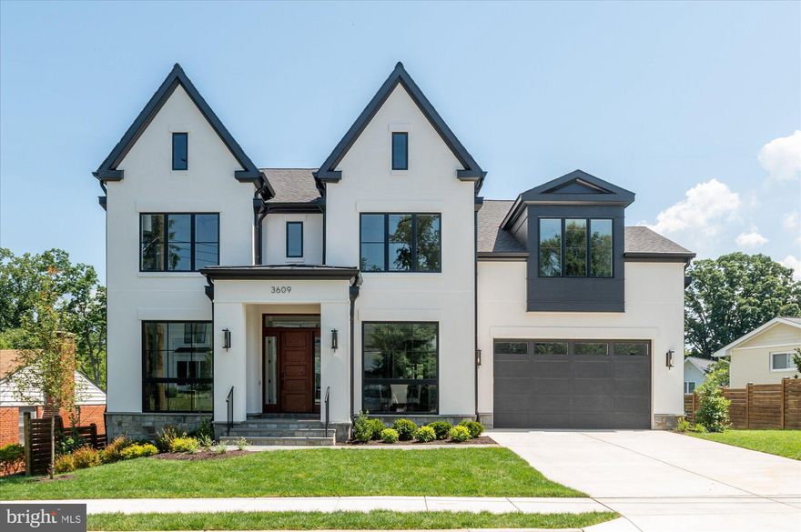 Finished and ready to move in! Cherry Hill Custom Homes presents this beautiful new custom home in sought after Country Club Hills in North Arlington. This home features 6 bedrooms, 6 full bathrooms, and 2 powder rooms with 6,320 square feet of finished living space over three levels. The main level includes 10ft ceilings, gorgeous wide-plank engineered white oak wood floors, a beautiful gourmet kitchen with rear prep kitchen, frame-less custom cabinetry and quartz countertops. The kitchen overlooks a great room with coffered ceiling and gas fireplace with tile surround and an off-set breakfast nook for casual family dining. Through the butler's pantry is an elegant formal dining room with abundant natural light. The screened porch off the breakfast nook offers an amazing outdoor living space overlooking the backyard. A guest suite that can be used as bedroom or office, a spacious mudroom with built-in cubbies, and two powder rooms complete the main level. The upper level is highlighted by a luxurious primary suite with spacious dual walk-in closets with built-ins, a spa-like bathroom with double vanities, stand-alone soaking tub, and heavy glass enclosed shower. The walk-out lower level includes a recreation room with wet bar, exercise room, a game room, and an additional bedroom with full bathroom. This home has a built-in elevator shaft for optional conversion. Convenient to Washington Golf and Gulf Branch Nature Center. Jamestown ES/ Williamsburg MS/ Yorktown HS.