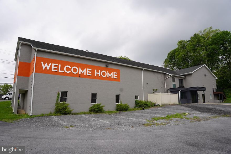 Prime real estate offering high visibility and robust traffic count, making it the perfect location for your business.  Situated on a corner lot with dual access from Martinsburg Pike and Old Martinsburg Road, this property offers a surplus of parking spaces.  Ideal for medical or professional offices.  Tenants are responsible for any improvements required to create their ideal workspace.  Featuring 3870 square feet (auditorium side) of customizable space, lease the entire 7600 square feet main floor (lease price is based on $15/sq ft plus NNN).  The landlord is open to a five-year lease agreement, ensuring stability for your business.