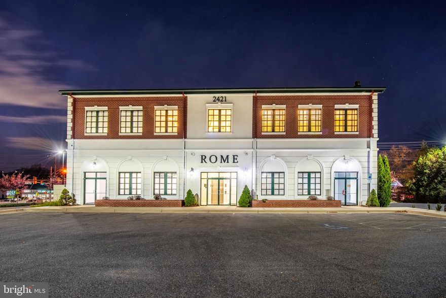 Discover this impressive 8,000 square foot commercial building set on a sprawling 1.03-acre lot, boasting professionally designed finishes by Design Concept. Featuring soaring 15-foot ceilings and an executive suite complete with an electric fireplace, this space exudes sophistication and functionality.  Designed with versatility in mind, the layout allows for use as four separate units or as a single tenant space, making it ideal for a range of businesses.  Enjoy the benefits of acoustical panels for optimal sound control, ensuring a productive environment.  Security and comfort are paramount with a state-of-the-art video surveillance system, key fob access, and a cutting-edge, energy-efficient HVAC system featuring four zoned heating and air.  The building is Energy Star certified and equipped with a durable 50-year roof.  Accessibility is enhanced with an elevator featuring an 8-foot cab and five ADA-compliant bathrooms. Daylight lighting throughout the building creates a bright and welcoming atmosphere.  With parking for 46 vehicles, this property is ready to accommodate your business needs. Don’t miss this unique opportunity to elevate your enterprise in a premier & convenient location!