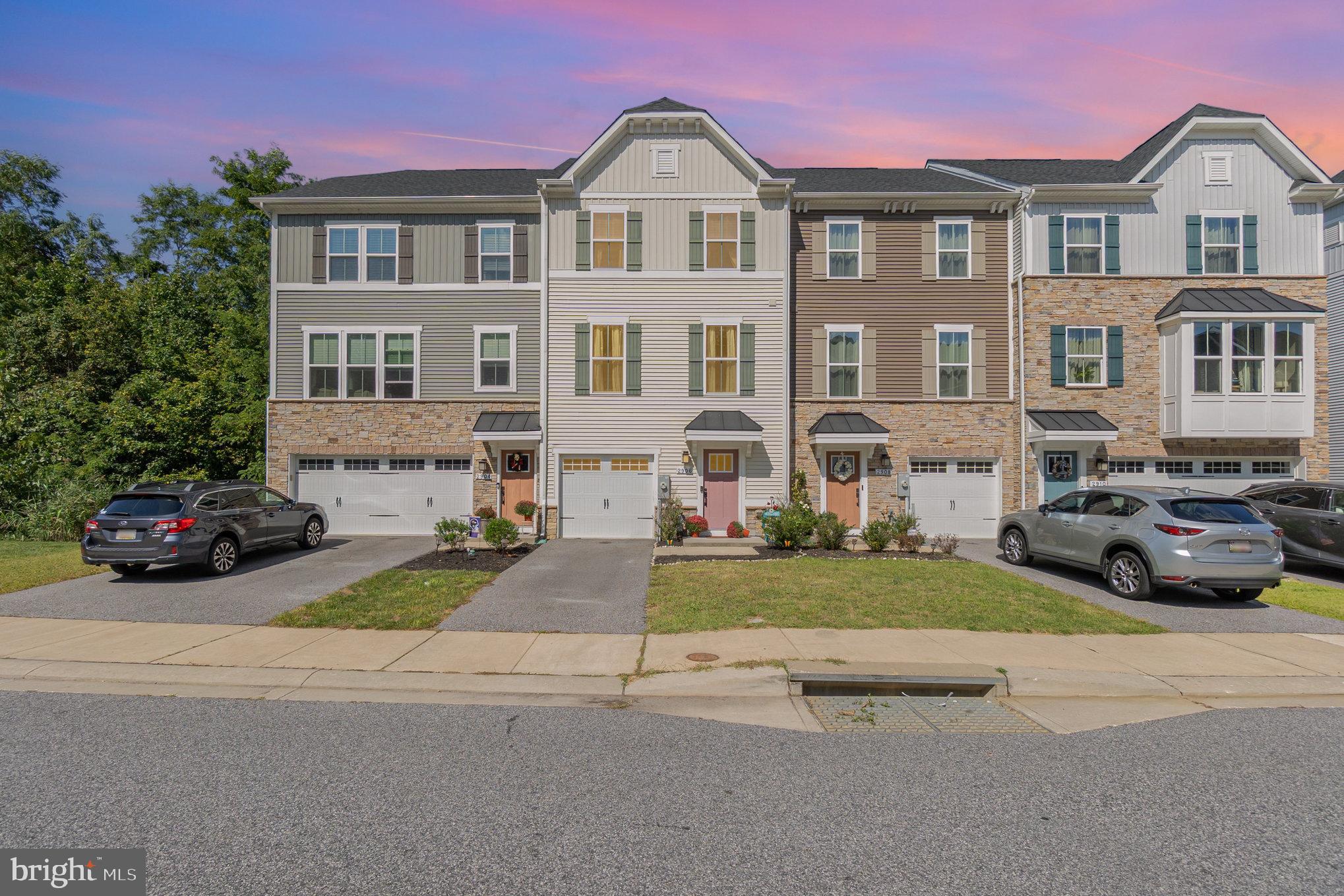 Welcome to 2906 Shaws Road! This beautiful 3 bedroom, 2.5 bath townhome is located in the desirable gated community of Shaws Discovery in Sparrows Point. The main level showcases an open floor plan with tall ceilings, recessed lighting, and luxury vinyl plank flooring. The gourmet kitchen is equipped with stainless steel appliances, a spacious island, and a pantry. Just off the dining area, step outside to the back deck overlooking the fully fenced yard with durable vinyl fencing, perfect for entertaining or relaxing outdoors. Upstairs, the primary suite offers a walk-in closet and a private bath with a glass-enclosed shower and double-sink vanity. Two additional bedrooms, a full hall bath, and a conveniently located laundry room complete the upper level. The entry level features a versatile finished space with access to the backyard, ideal for a rec room, home gym, or office. Additional highlights include a one-car garage, private driveway, and guest parking throughout the community. Enjoy all that Shaw’s Discovery has to offer, including a community pavilion, pier, boat ramp, wooded walking trails, and the security of gated access. Don’t miss this opportunity, join us for the Public Open House on Thursday, September 11th from 4:30–6:30pm! Home is Where Your Story Begins!