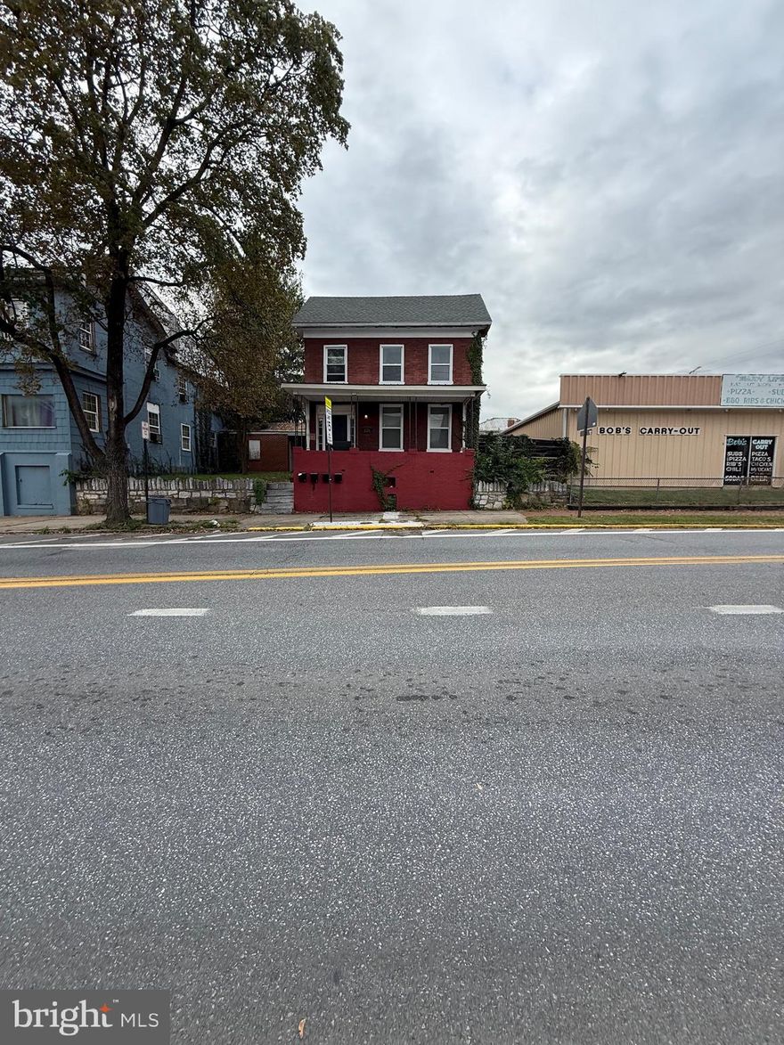 Discover an excellent income opportunity with this well-maintained 4-unit building located at 126 N Raleigh Street in the heart of downtown Martinsburg. This solid brick 4-unit building underwent major renovations in 2016 including updates to kitchens, baths, flooring, electrical, and roof. Three units are occupied, and one unit is vacant and move-in ready, perfect for an owner-occupant or new lease. Each unit has a separate electric meter and private entrance. Property shows exceptionally well and offers a 6-bay garage! Conveniently located near shopping, dining, MARC train, and commuter routes. A turnkey property with strong rental history and long-term potential!