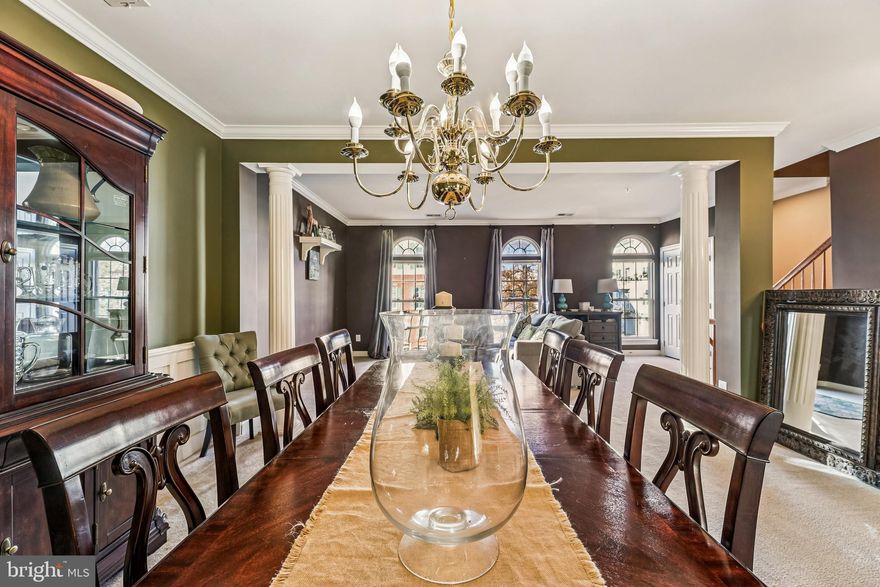 Experience luxury living in this stunning 3-bedroom, 2.5-bath condo-style townhome located in an exclusive gated community. Boasting nearly 3,000 square feet of elegantly designed space, this home offers the perfect blend of comfort and sophistication.

The expansive layout features a chef-inspired gourmet kitchen equipped with top-of-the-line appliances, premium finishes, and ample counter space—ideal for both everyday living and entertaining. Just off the kitchen, enjoy a private deck perfect for relaxing or outdoor dining. The inviting living area is anchored by a beautiful fireplace, adding warmth and style to the home’s modern ambiance.

Spacious bedrooms, designer bathrooms, and high-end touches throughout elevate the residence’s appeal.

Ideally situated, this home is just minutes from I-95, directly across the street from Stone Bridge Shopping Center, and only a short drive from the mall and NOVA Community College. With excellent access to restaurants, shopping, and public transportation, this location offers unmatched convenience.

Set within a secure, beautifully maintained gated community, this exceptional property promises privacy, luxury, and accessibility—all in one remarkable package.