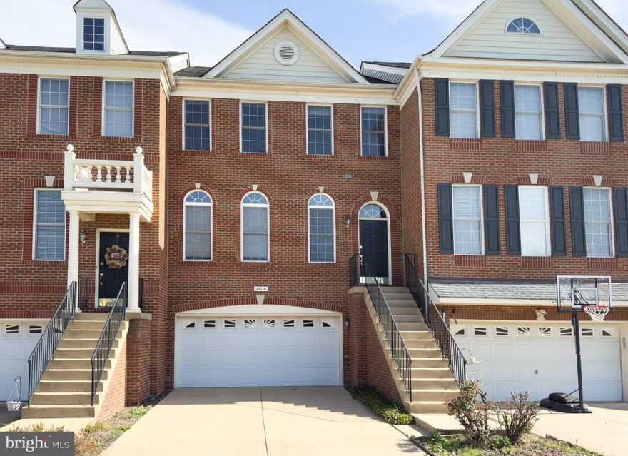 Spacious 24' wide, 3-level Toll Brothers townhome with a 2-car garage in a great school district. Upgraded throughout with hardwood floors, a gourmet kitchen with stainless steel appliances, an oversized refrigerator,  updated dishwasher, granite countertops, a backsplash, an island, and a breakfast nook. The family room off the kitchen has a cozy fireplace.

The dining and living rooms are bright and open. The master suite features a bath with a jacuzzi tub and a skylight. Laundry is on the bedroom level with a new washer.

The lower level includes a rec room with built-in speakers and walk-out access to a brick patio and fenced backyard.