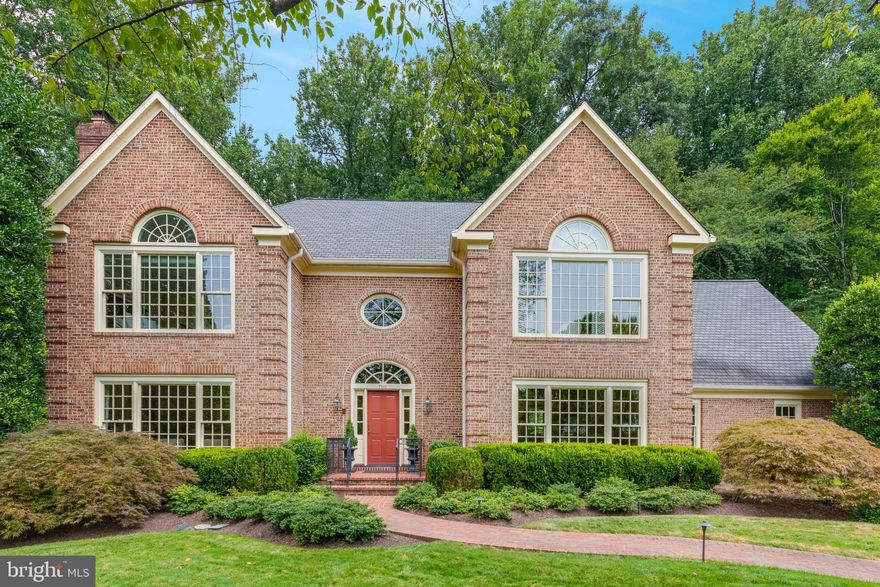 Introducing an exceptional property where luxury meets functionality in every detail. As you step into the grand two-story open foyer, you're immediately greeted by an air of elegance and sophistication that permeates throughout the entire home. The heart of the home lies in the gourmet kitchen, breakfast room, and sunroom, which seamlessly open to the backyard oasis. Enjoy breathtaking views of Charles Owen’s distinctive designs, overlooking Scott’s Run Nature Preserve just beyond the classically landscaped grounds. The updated kitchen with a large center island, breakfast room, and gorgeous light-filled sunroom offer panoramic views of the meticulously landscaped yard, as well as endless opportunities for outdoor enjoyment and entertaining.  Adjacent to the kitchen, the family room boasts a stunning stone fireplace, creating a cozy and inviting atmosphere for gatherings with loved ones. For those in need of a dedicated workspace, the main level also includes a conveniently located bedroom/office. Additionally, a formal living room and dining room offer refined spaces for hosting guests, while a powder room provides added convenience for residents and visitors alike. Upstairs, discover four bedrooms, including a luxurious owner's suite complete with an attached boudoir, two walk-in closets and an opulent owner's suite bathroom, providing the ultimate in comfort and indulgence. The lower level offers additional living space with a bonus room and large recreation room, complete with doors that lead out to the backyard oasis. A separate caterer's kitchen is also located on the lower level along with an oversized storage room. There are many luxurious features in this stunning home, including a Venetian glass chandelier in the foyer, built-ins throughout the house, an updated kitchen, a remodeled laundry room, Anderson windows, new carpet and fresh paint, as well as a generator—to name a few. The private fenced rear yard backs to Scott’s Run Nature Preserve, offering a level of privacy rarely afforded to residents of McLean. Nestled on a tranquil cul-de-sac, this property is a commuter's dream, with easy access to the beltway, Metro, DC, and Tysons and a mere 2 miles to the heart of McLean. Don't miss the opportunity to make this exquisite property your own, where luxury, comfort, and convenience converge to create the ultimate dream home experience.