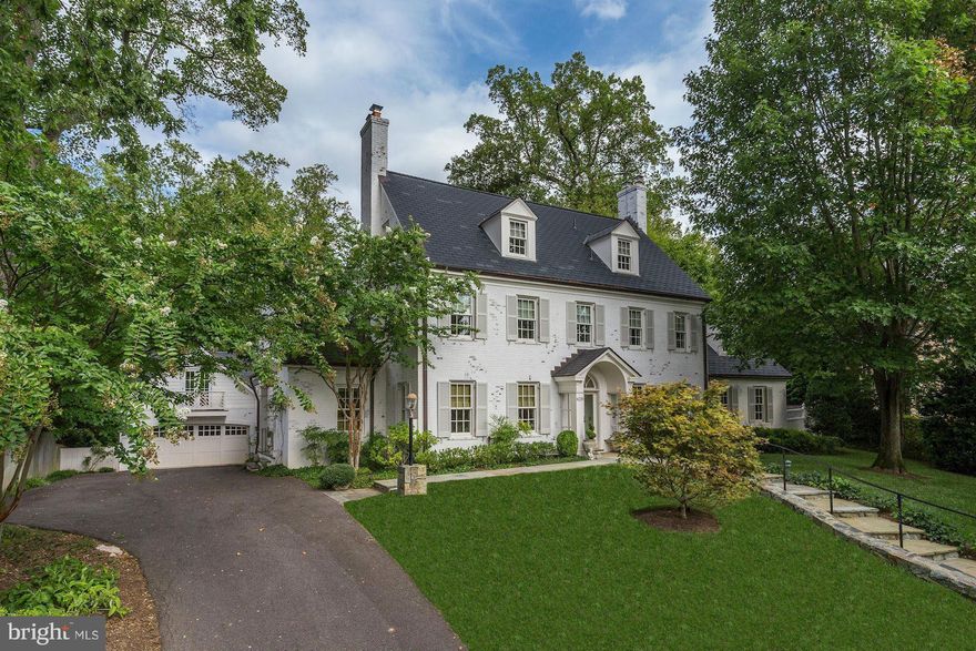 *JUST LISTED!*  Gorgeous whitewashed brick colonial in private, parkland setting recently renovated & expanded by Gibson Builders. Heated pool, elevator, open Kit/Fam Room, formal Living/Dining Rooms & sep Library, lavish Owner Suite w/ dressing room & 2 BAs, charming detached 2-car Garage/Carriage House with office above. Fine finishes & meticulous attention to detail throughout - a must see!