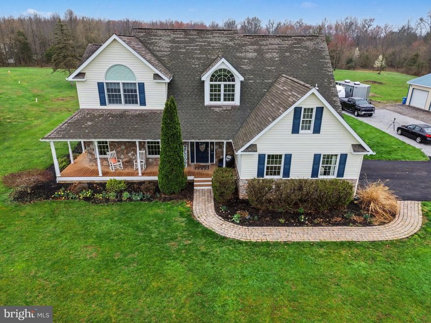 Welcome to 105 St. John’s Road in Littlestown, PA — a beautifully maintained custom colonial set on over 4.5 private acres.This stunning home offers the perfect blend of elegance, comfort, and functionality. The gourmet kitchen is a true centerpiece, featuring custom cabinetry, granite countertops, a double oven, a spacious pantry, and a large island with built-in cooktop—ideal for both everyday living and entertaining.
Enjoy formal gatherings in the living and dining rooms, connected by charming French doors. Just off the kitchen, the inviting family room boasts a striking floor-to-ceiling stone fireplace with a pellet stove insert, creating a warm and cozy atmosphere.
The luxurious primary suite includes vaulted ceilings with recessed lighting, walk-in closets, and a spa-like bath complete with a freestanding soaking tub, separate shower, and double vanity.
Additional highlights include:
Two-zone HVAC system (replaced in 2019)
Bonus room (17x12) with its own split-unit system—perfect as a playroom, office, or guest space
. Unfinished basement with high ceilings, ready for your personal touch
Step outside and take in everything this property has to offer. Relax on the wraparound covered porch or entertain guests on the expansive maintenance-free deck overlooking a fully equipped outdoor kitchen. The space also features a stone patio, retaining walls, and a fire pit—perfect for gatherings and cozy nights under the stars.
Car enthusiasts and hobbyists will appreciate the two-car attached garage plus an impressive 30x40 three-car detached garage, ideal for a workshop or storing collectible vehicles.
With over 4.5 acres of open space, this property offers endless opportunities for outdoor enjoyment, from family gatherings to peaceful country living.
Don’t miss your chance to tour this exceptional property—schedule your showing today before it’s gone!