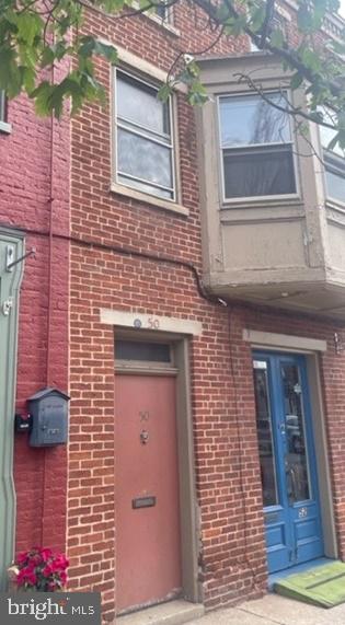 Heat Included!! 2nd Fl 1 bedroom 1 bath apartment with private entry. Living room with hardwood floors and large windows. Updated kitchen with appliances. Shared outdoor area with access to coin-op washer and dryer. No pets and no smoking indoors.