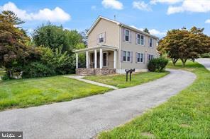 Welcome to this Gorgeous Newer Colonial Home offering 3 Bedrooms and 2 Beautiful Full Bathrooms (Completely rebuilt in 2015). Enter in through the Covered Slate Front Porch into the Open, Floor Plan of Living Room, Dining Area and Beautiful Open Kitchen with plenty of White Cabinets, Granite Countertops, Tiled Backsplash, Granite Breakfast Counter with 4 Stools, Gas Stove with Stainless Steel Vent, Stainless Oven, Microwave, Dishwasher, Wine Refrigerator and has under sink water filtration system. This amazing Open Area has Beautiful Hardwood Floors, Recessed Lighting and Plenty of Windows with Pleated Shades that open from bottom or top. Also located on this Main Floor is the Laundry Room with w/ Wash Tub, Full Bathroom with Tiled floor and Glass Shower and Tiled back Foyer leading out to back Driveway. The Upper Level Offers Main Bedroom with Walk In Closet, Hardwood Floors, 2 Additional Bedrooms and Full tiled Bathroom with Glass and Tiled Shower. The Basement full and mostly finished. Walking distance from park, public transportation and Downtown Malvern.