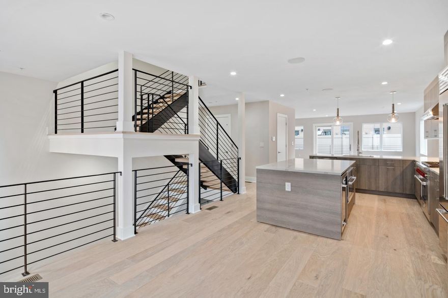 Jim Onesti and The McCann Team does it again! Welcome to Museum Estates, a new construction development near Logan Square - steps from Center City, Rittenhouse, Fairmount Park and the Schuylkill River Banks. This home offers 4 bedrooms, 4 full & 2 powder baths, an elevator, finished basement with media room and an amazing roof deck! Enjoy top-of-the-line design and construction by the City's premier architect and developer. This unit does not have a garage. The second floor gourmet kitchen has Sub-Zero, Bosch and Wolf appliances, Ultra Craft custom cabinetry, stone countertops and a large deck for entertaining. The third floor has two large bedrooms with beautiful hardwood floors, generous walk-in closets and en-suite bathrooms. There is also a laundry room with full sized, front loading washer and dryer. The master bedroom and bath are an owner s dream - two walk-in closets, double vanity with stone countertop, custom tile shower with frameless glass enclosure and multiple shower heads! The home also features an energy efficient dual HVAC system, tall ceiling heights and a smart home technology package with security alarm, video intercom and home automation system. All within the Greenfield School Catchment and the heart of Center City.Check OPA for 2019 taxes due to possible citywide reassessment.