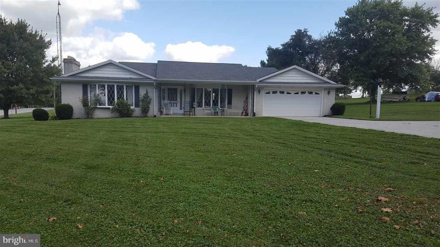 Well cared for brick ranch on large corner lot.  Large country kitchen. Beautiful Bow window in dining room & living room. Corner brick fireplace in living room. Unfinished basement has full brick fireplace and walk out. Handicap accessible. Over sized 2 car garage. Home warranty included for peace of mind.