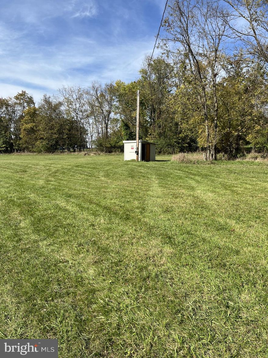 Beautiful home site on top of a knoll to build your dream home. This home site has a well, electric and approved septic field. There is also an old silo on the property.  Just minutes to the Rt. 9 Bypass. A must see!!