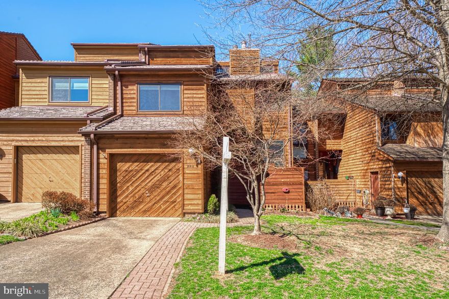 LAKE COMMUNITY HOME WITH GARAGE, PRIVATE OUTDOOR  SPACE, APPROXIMATELY 2800 SQ FT OF MODERN LIVING SPACE!  This contemporary floor plan features 3 levels,  vaulted ceilings, walkout to outside space on every level.  There are gorgeous hardwoods on the main level.  The modern, updated kitchen has been designed to follow the contemporary style of the home.  It has sleek solid wood cabinets, upgraded appliances and a modern backsplash.  A row of sliding doors across the back of the home, brings the light and greenery of the gorgeous rear patio in.  All windows and doors have recently been replaced.  There are beautiful views from every window. The spacious and sunlight filled  living room features one of two gas fireplaces.  There is a front room off the foyer that can be used as a formal dining space or a home office.   All bedrooms on the upper level are large with vaulted ceilings and built in alcoves. There is a private deck from the primary suite as well as a separate dressing room, double closets and a primary bath that has an updated vanity and has a soaking tub and separate walk in shower.  The lower level has a large family room with a 2nd gas fireplace and door to the backyard. There is a 4th bedroom, updated full bath and storage/laundry room.  Enjoy a beautiful front yard, and a private fenced backyard. This is a great home for someone that wants space and convenience!  The prime location is conveniently located near the South Lakes Shopping Center shops and restaurants and less than 2 miles to Metro.  The cluster dock right down the street for canoeing, kayaking, fishing and walking paths.  Enjoy all Reston Association Amenities; pool, tennis, basketball, volleyball courts and tot lots. This home has been meticulously maintained over the years. There is new roof with a lifetime transferrable warranty and hvac replaced 2023.  It is truly move in ready! Open House  Saturday 3/22, 12:00-3:00.