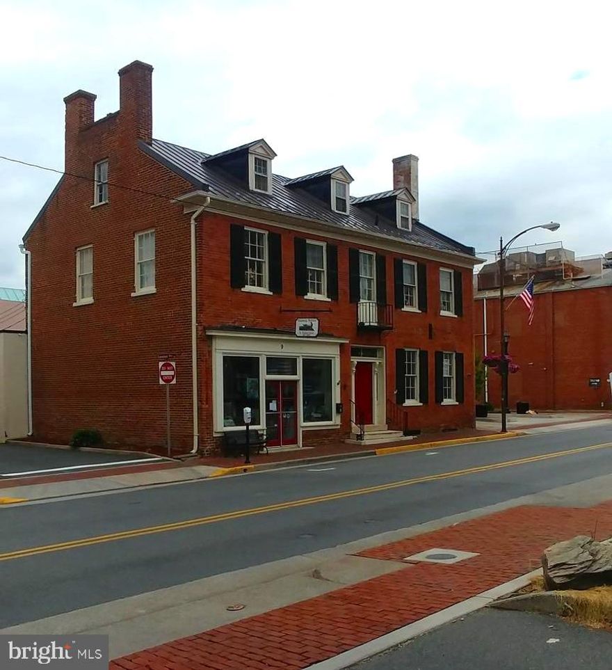 This property is located right next to the Town parking garage which allows  First two hours FREE PARKING and is less than a half block to the Loudoun County Court House in Historic Downtown Leesburg.   Great location and convenient to shops banks, restaurants and more.   Unit is Located on the First/Main level and has a number of improvements including: Windows, Air Conditioning, Commercial Kitchen New Common Bath, Private Bath, Commercial Washer & Dryer, Paint & more.   Front and rear entrances.  This property is Zoned  B-1.  Uses include but not limited to: Retail, Medical, Office, Professional, Exercise, Restaurant, Hair Salon, Bridal Shop, Church and so much more.   You will be hard pressed to find a more convenient location with lots of foot and vehicle traffic under $20.00 per square foot.