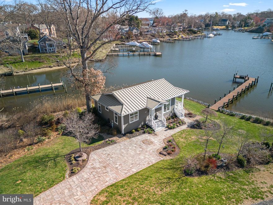 Welcome home to your dream waterfront cottage in Severna Park!  Move right in to this stunning craftsman style design with an open floorplan, walls of windows overlooking the serene waters Cypress Creek, and a rear porch perfect for relaxing.  A pier, dock and 100' of water frontage with beach entry plus ample space to store all your kayaks & SUPs, this home was designed with outdoor fun in mind.  Gorgeous hardwood floors, fresh neutral paint and loads of natural light make this house picture perfect.  Designer inspired and updated gourmet kitchen with spacious island, tiled backsplash, stainless appliances and white shaker cabinetry open to the dining area and great room beyond.  With two bedrooms, an updated full bathroom along with loads of storage space, you'll want to call this one home!  Whether you are looking to downsize to a tiny house with grand appeal or a waterside weekend or summer home, 732 Dill Road is sure to deliver your coastal waterfront dreams!  Schedule your private tour today.

High end building materials include metal roof, Hardie Plank siding, Jeldwen aluminum clad windows & doors. Pier in 2014, Riprap in 2021.