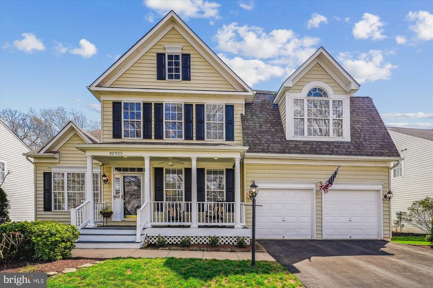 First time offered for sale.  This porch-front VanMetre Sinclair has been meticulously upgraded and maintained by the original owners.   Enter the wide, two-story foyer that opens into huge formal rooms with high ceilings and loads of light.  The kitchen island is expansive with room to serve plus sit and dine.   Hardwood floors gleam throughout the main level and accentuate the beautiful built-ins. Walk-out to the maintance free trex screened porch and deck, with access to the lower yard and overlooking the wooded view.  Upstairs you will find one of the largest primary suites you've seen with two, huge walk-in closets and a fully renovated luxury bath.   Each of the addtional three bedrooms on the upper levels are graciously sized, all with a walk-in closet.  The hall bath has also been fully renovated.  In the basement is another huge bedroom and full bath, making guests feel welcomed.  A massive recreation room and wet bar give you plenty of room to play and entertain. There are two, spacious storage rooms on the lower level with an option to finish additional space.  The daylight basement walks out to the expansive custom, paver patio and built-in firepit.  Take in the wooded view in complete privacy.  Meticulously maintained through the years.   Kitchen Update and Expanded Island and Coffee Bar 2015 - New Hardwood Floors, Main Level 2015 - Roof 2016 - Trex Screened in Porch and Deck, 2017  - Both HVAC Systems 2018 - Custom Paver Patio and Firepit 2021 - Rock Walls and Paver Walkway 2021 - Carpet Upper Level 2021- Kitchen Refresh 2021 - Laundry Room Renovation 2021 - Upper Level Bathrooms Fully Renovated 2021-  Basement Updated w New Carpet and Paint 2024.  Walk to Hillside ES.  Zoned for  Eagle Ridge MS and Briar Wood HS.   The Broadlands Community offers three outdoor pools - fountain pool, quiet swim and Olympic sized all with toddler pools- miles and miles of walking trails, sport courts and comunity center plus a Nature Center offering summer camps and activities.  Easy commute via Rts. 267, 28, 7 and 50 or ride the near-by Silver Metro to Dulles Airport, Tysons and DC.   The location is absolutely prime and this beautiful home is picture perfect and turnkey!  Open Friday, 4-6 pm and Saturday, 12-2 pm   Come and see!