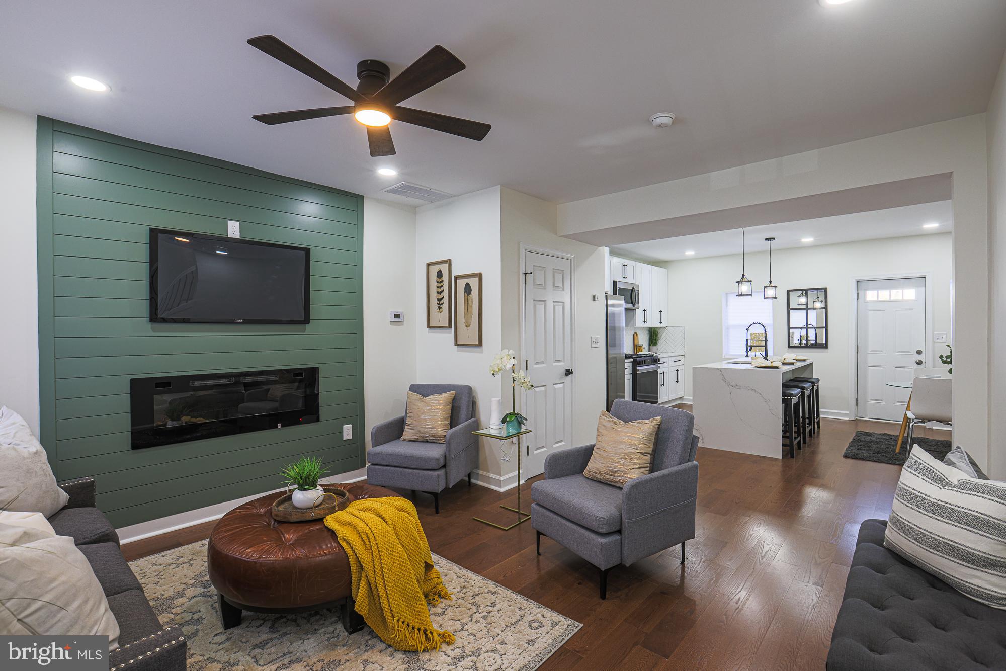 Discover this stunning, fully renovated end-of-group row home in the thriving Calloway-Garrison community! The open-concept main level boasts a stylish kitchen with stainless steel appliances, granite countertops, and a spacious island—perfect for cooking and entertaining. The fully finished basement offers versatile living space, ideal for a cozy family room, game room, or home office. It also features an additional bedroom and a full bathroom for added convenience. Enjoy the privacy and charm of an end-unit home, complete with a newly renovated front porch. Whether you're a first-time homebuyer or seeking a warm and inviting retreat, this home is a must-see! Home Warranty Included! Schedule a showing today!!