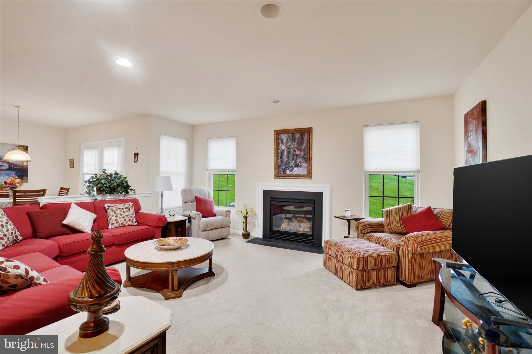 Welcome to The Crossings at Rocky Springs—an exceptional and vibrant HOA community offering carefree condo living. This beautifully maintained 2-bedroom, 2-bathroom home combines comfort, function, and space in all the right ways.
Step into a spacious, open-concept living room perfect for relaxing or entertaining. The kitchen is thoughtfully designed with a center island, making meal prep and hosting a breeze. Both bedrooms are generously sized and located just off the main living area, including a primary suite with walk-in closet and private en suite bath. A convenient laundry room is also on the main level.
The entry-level features a two-car garage plus an impressively large basement—ideal for storage, a recreation area, or potential expansion into additional bedrooms or an in-law suite.
Enjoy peaceful mornings or evenings on your private patio, and let the HOA handle the upkeep—exterior building maintenance, lawn care, snow removal, and trash are all included.
Community amenities abound: take advantage of the indoor pool, tennis courts, fitness center, walking/jogging paths, and clubhouse—available for private events or group classes.
All of this comes with a surprisingly low monthly fee. Come see why this active community is the perfect place to call home!