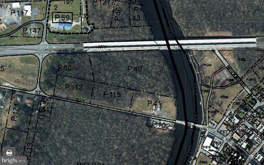 12.92 Acres of Riverfront Land on the Pocomoke River.  Property is located directly across from Cypress Park in Pocomoke City, but on the Somerset County side of the River.  Own your very own riverfront boating and fishing dock right between the the iconic drawbridge and the scenic highway bridge! 
*See attached photos for imaging on the Flood Plain (Light Blue Areas) , Critical Areas (Yellow Areas) and Wetlands (Green Areas)  All interested buyers are advised to contact Somerset County to inquire about feasible uses for the property.