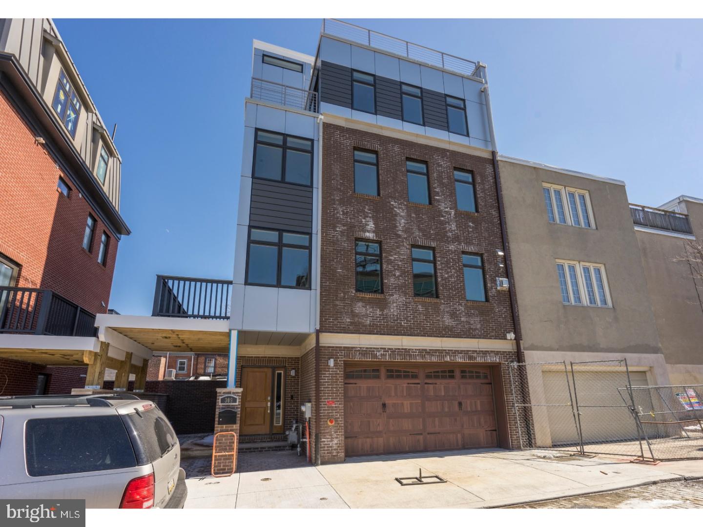 The past meets the present at AGA Developer's highly anticipated Janus Estates in Old City. A rare opportunity to own a luxury, new construction home built by one of the city's most reputable developers. Ideally located in a quiet enclave of historic Old City, this 4 story property will feature 3 bedrooms, 4 full baths, 3 half baths and 2 car garage parking. These extra-wide homes will offer over 4,000 square feet of plush living space that will be drenched in the finest finishes; including custom cabinetry imported from Italy's Linea Quattro, Viking/Wolf professional series appliances, Porcelenosa stone/tile package, custom hardwood flooring throughout, Samsung or LG Washer/Dryer, iPad based smart home technology/security system. These homes will be absolutely loaded with premium finishes. The entire 4th Floor is a dedicated Master Suite w/ spa-inspired bathroom complete with soaking tub and oversized shower, walk-in closet and private balcony. The finished lower level will be the perfect extra bedroom/home office/media room complete with full bathroom. The home will include an upscale roof deck with 360 degree views of the city, a paver flooring system, pilot house w/ wet bar and powder room. The homes will include a 10-year tax abatement and a 1-year builder's warranty.