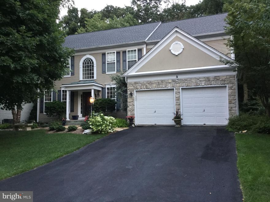 Okay, let's start with immaculate.  This house has been maintained to the point where it is better than new.  It is, simply, immaculate.  Everything works, everything fits, everything looks great, feels great - this is your new home - just waiting for you to come and settle in.  The gracious 2 story foyer opens onto the formal living room and formal dining room on either side, and leads straight back to the sunny 2 story family room, breakfast room, office, and kitchen.  This is the kitchen my wife would kill for - miles of granite, a real live pantry that's not just a closet with food in it, and a professional grade gas range with two ovens (one conventional, one convection oven).  All the rooms at the back feature lots of windows and a southern exposure so the whole house has a sunny disposition - and so will you.  The the main floor and upstairs hallway have solid oak flooring throughout, with tile in the kitchen, breakfast area, 1st floor laundry, pantry, and all the bathrooms.  The basement is finished with enough space that the currently has  a study area, TV/video area and still enough room for pool (with no short cues) and foosball tables.  There is also a spare room (guest bedroom?) and full bath, along with storage and an additional laundry area if you feel like you just need the exercise.  Off the kitchen, a roomy deck with Chinese Chippendale railing leads to a beautifully landscaped, fenced backyard featuring a koi pond and waterfall.  Take a walk through the house on our 3D vitual tour (it's the little movie camera icon in the upper left) or at 1203 Pepperwood.com, and then come visit and fall in love.  Your new home is waiting.