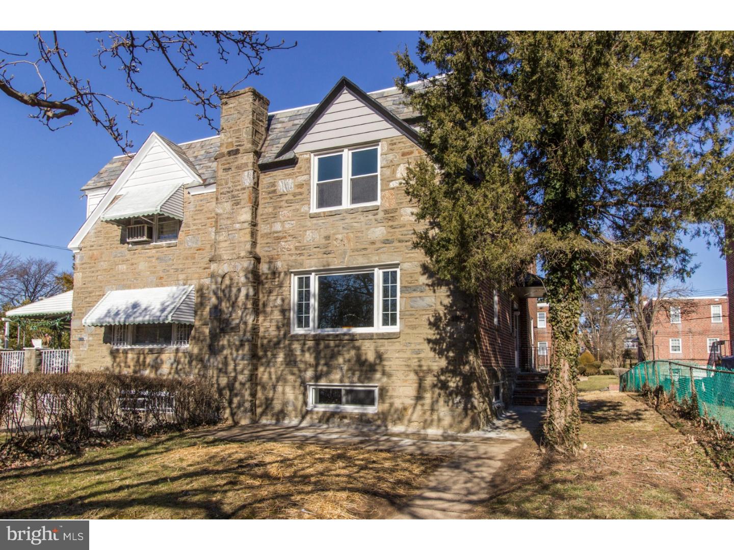Welcome home to this fully renovated stone and brick twin in desirable Mt Airy location. This light-filled 3 BR/2.5 BA light-filled home features new electric, new HVAC, new kitchen, new bathrooms, refinished hardwood floors and finished basement. Open-concept living floor with spacious living room, dining room and new open kitchen. Eat-in kitchen features white shaker cabinets, carrara marble counter tops, white subway tile back splash and stainless steel appliances. Upstairs are 3 spacious bedrooms including a large master suite with new tastefully renovated bathroom. 2 additional BR's plus lovely hall bathroom complete this floor. Partially finished basement adds almost 200 square feet of living space perfect for home office/Play room/media room. Laundry room and access to outside. Attached 1-car garage. Easy walk to train station, convenient to Chestnut Hill, Center City and the suburbs. CNN recently ranked Mt Airy among the top 10 best big city neighborhoods in the US.