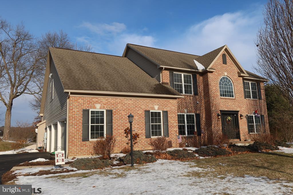Build a lifetime of memories in this lovely Saybrook two-story. A beautiful entrance serves as a welcoming introduction to tasteful selections, comfort and function. Discover rich hardwood floors, numerous built-ins, oversized windows, exceptional trim work/moldings, a grand staircase, 3 sliders to the amazing backyard and more. Central and the heart of this home is a great kitchen, complete with breakfast bar, stainless appliances, Corian countertops, a charming window seat and adjoining breakfast nook. A gas fireplace graces the vaulted family room. An office with French doors, formal dining room, living room (now serving as a gym), half bath and laundry complete the main floor. Above find a generous primary suite with luxurious bath, three spacious bedrooms, full bath and reading nook. Residents love this quiet location and back yard greenspace. Beautifully landscaped, 3-car side entry garage.