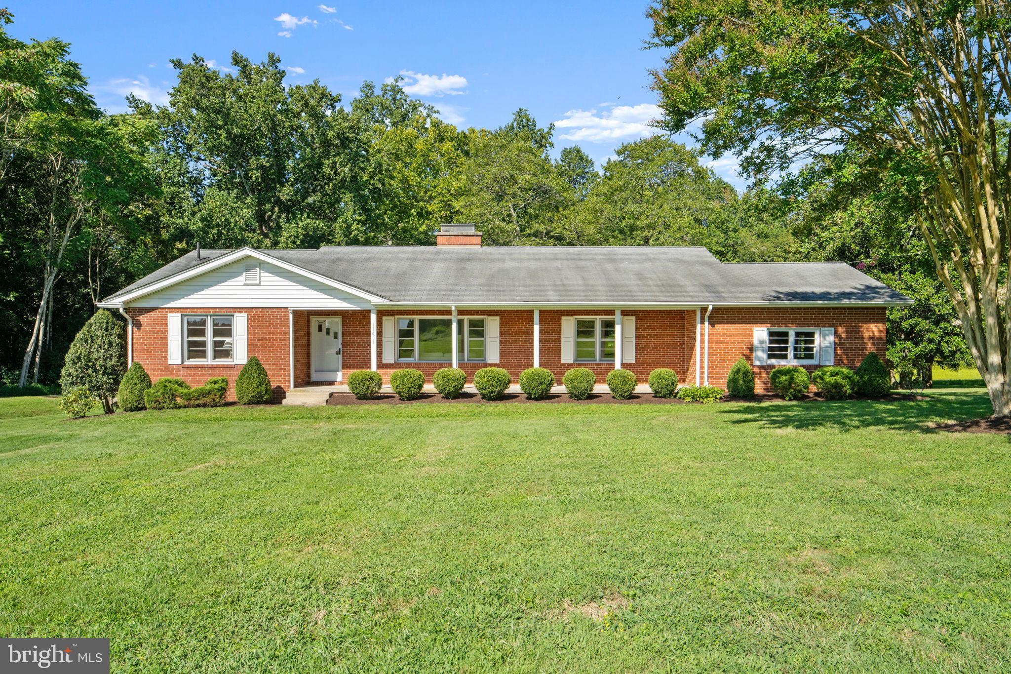 Discover this classic Original Owners 3 Bedrooms and 2 Full baths all brick Rambler with full basement sitting on 2.98 acres in Upper Marlboro.
The home is full of original character and just waiting for your personal touches. Come and enjoy outside living with a full rear screened in pouch to relax having your morning coffee surrounded by farmland and serene views. You can place you Rocking chairs on the large front porch and enjoy the up coming fall weather. All bedrooms feature original hardwood floors. The large eat in kitchen with a pantry is equipped with stainless steel appliances. You can entertain in your dining area along with you large living space with a beautiful fireplace for the holidays. You have access to 2 washers and dryers with the convenience of one set on each floor of the home. After a long day at work and cold rainy day pull right into your garage to enter your new home.
For all showings contract Showing Time or Listing agent.
