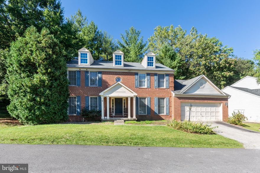 This wonderful home sits on a large lot and is close to everything! Entering this home, you will step into the large foyer and to your right is the dedicated office area and over to left is the living room.  Ahead you will find the dining room and the current owner is including the dining set as an extra bonus.  The kitchen features updated granite countertops, a stainless-steel awesome refrigerator with a large pantry and built-in desk area for an added convenience.  You'll enjoy the family room's natural lighting with skylights and the brick fireplace that opens to the eat-in kitchen area.  The oversized primary bedroom is located at the end of the upper hallway and offers a wonderful walk-in closet, and a gorgeous newly remodeled full bath that boasts plenty of natural light from the bright windows! The additional three other bedrooms all include oversized rooms.  Heading downstairs to the basement you can create on own additional entertaining area; currently this level offers tons of storage space. Outside you will find a rear patio that is great for entertaining and grilling your favorite meal.   Located on a corner lot, and a private lane with a two-car attached garage is just to name a few other bonuses for this home.  Having natural gas cooking and grilling with a forced air heating system are pleasing for today's buyers.  This home is conveniently located near all major roadways, and tons of shopping, and restaurants too.