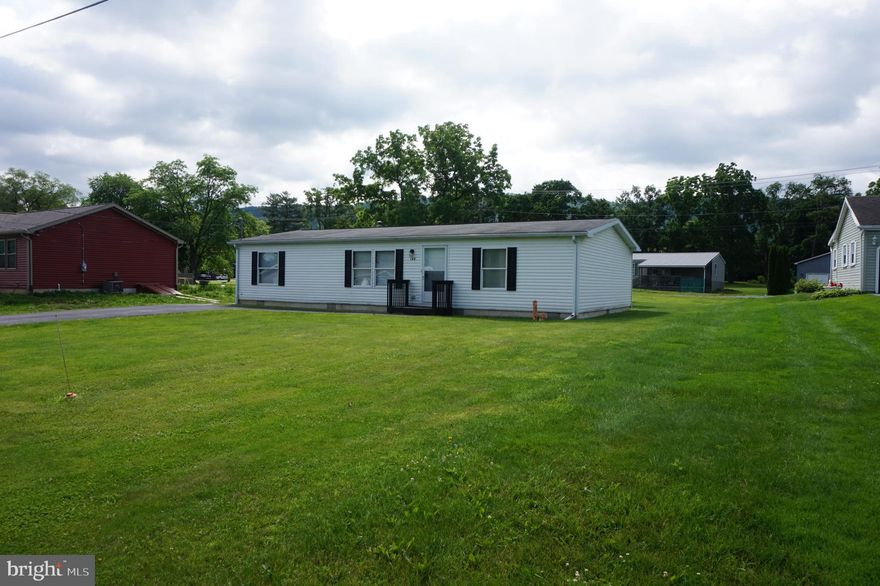 Experience the Convenience of Seamless Single-Level Living.  Located in the peaceful village of Mingoville within the Bellefonte Area School District, this charming ranch home offers true one-level living with a desirable split-floor plan design.  Step inside to an open-concept layout featuring vaulted ceilings, a comfortable living room, a well-equipped kitchen with included appliances, and a delightful dining area—perfect for both everyday living and casual entertaining.  The owner’s suite provides a private retreat with a walk-in closet and en suite bath, while two additional bedrooms, a full bath, and a super-handy laundry room complete the smart and functional layout.  Situated on a nice flat lot, this home also includes a large storage shed for all your extras. Enjoy the best of country living just moments from Nittany Country Club & Golf Course, and with easy access to major destinations—only 8 miles to downtown Bellefonte, 15 miles to Penn State University, and 19 miles to Lock Haven University—your commute is a breeze in any direction.