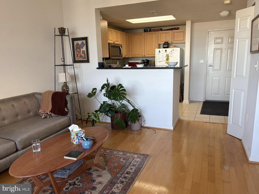 Opportunity--would you like to live so close to the Dunn Loring Metro that you can sleep in later?  Just a hop, skip and a jump.  In an affordable price range too with a lower than average condo fee.  And, you have your own private parking spaces across from the Elevator access.  Compare this fabulous crisp and clean  studio with the other nearby options at much higher cost with no parking space.  All the amenities you will want or need are here - see info in Documents.  A bright and sunny open floor plan with a view toward Tysons from your full glass windows.  An easy space within which to arrange furniture and enjoy minimalism - kitchen is easy to work in with a good amount of counter space, plenty of cabinets, refrigerator with icemaker and a gas range.   All has been immaculately maintained. 
 There's a place to store your bike on the garage level near your car.  Oh yes, easy location to reach grocery stores (Harris Teeter across the street), restaurants, all kinds of shops in the fabulous Mosaic District. Come and enjoy!    
Tenant occupied with 30 day notice to be given.
SHOWING TIMES:  M - TH ANY TIME. FRI. ONLY  BEFORE 3.  SATURDAY TBD. SUNDAY 3 HOURS ADVANCE NOTICE. AFTER 12 ONLY SHOWINGS