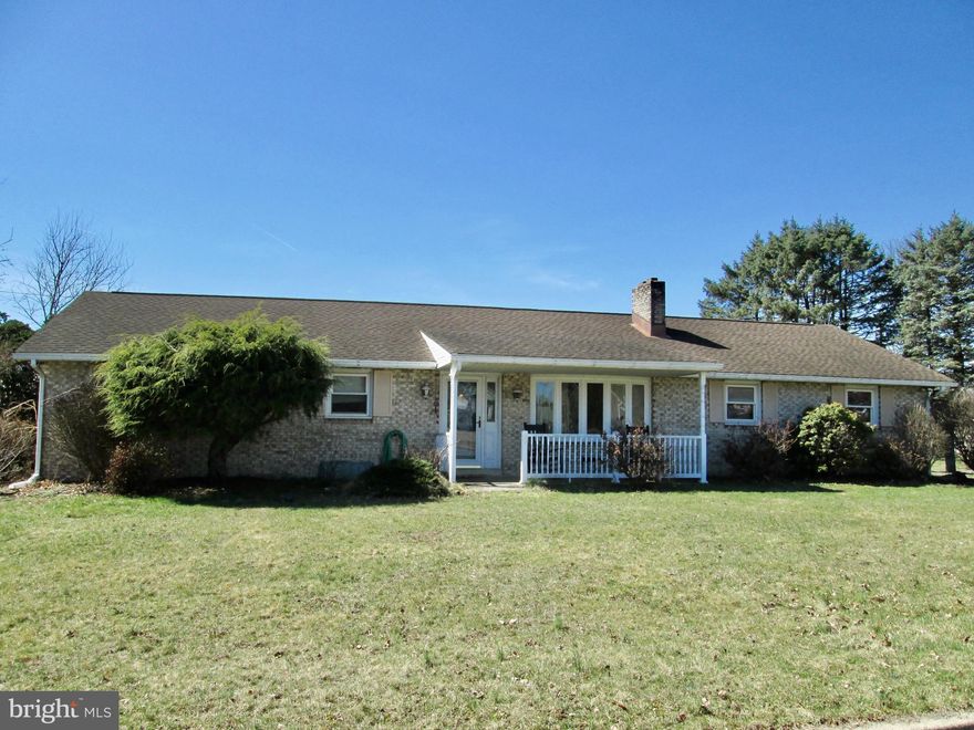 Welcome to this well-maintained ranch home situated on a level corner lot spanning over a quarter acre. This inviting property offers comfortable one-floor living with three bedrooms, two full bathrooms, and convenient main-floor laundry. The home is equipped with electric radiant ceiling heat and central air conditioning for year-round comfort. The modern kitchen boasts 30 handles of cabinetry and flows seamlessly into the dining area, where glass sliders open to a covered backyard patio—perfect for outdoor dining and entertaining. A large living room with a fireplace provides a welcoming space to relax and gather. The finished lower level adds significant living space, featuring a family room with a second fireplace and wet bar, a game room area, and a finished room ideal for a possible fourth bedroom, home office, or guest space. Conveniently located just five minutes from PA State Routes 222 and 183, this home offers easy access to commuting routes while maintaining a quiet residential setting. A well-maintained property with versatile living areas inside and out—ready to make it your own