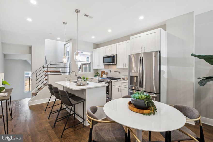 Never worry about parking again! This contemporary, single-family home in the heart of Brewerytown is located across N. Etting  Street from a city-owned parking lot.

Upon entering, you'll be greeted by hardwood floors, a flood of natural light, and an open and inviting living area that seamlessly connects to the kitchen. The kitchen features soft-close cabinets, sleek countertops, and stainless steel appliances, ideal for culinary enthusiasts and entertainers alike.

This home offers four generously sized bedrooms, providing plenty of room for relaxation and privacy. The primary suite features a spa-like bathroom equipped with custom tiles and a designer rainfall shower, offering a perfect retreat after a long day.

With three full bathrooms, morning routines for the entire household are a breeze. The finished basement provides additional living space, perfect for a home office, gym, or recreation room.

Step outside to your private backyard - a serene space for outdoor activities or simply enjoying a quiet moment. For those who love city views, the roof deck offers a spectacular skyline vista, ideal for entertaining or unwinding.

Located across from Athletic Square Park, this home provides easy access to recreational facilities and local amenities. Also around the corner are Brewerytown Garden, Together Skateboarding & Cafe, and Human Robot. Approximately four (4) years remaining on the property tax abatement.

Visit an open house this weekend or schedule your private showing today!