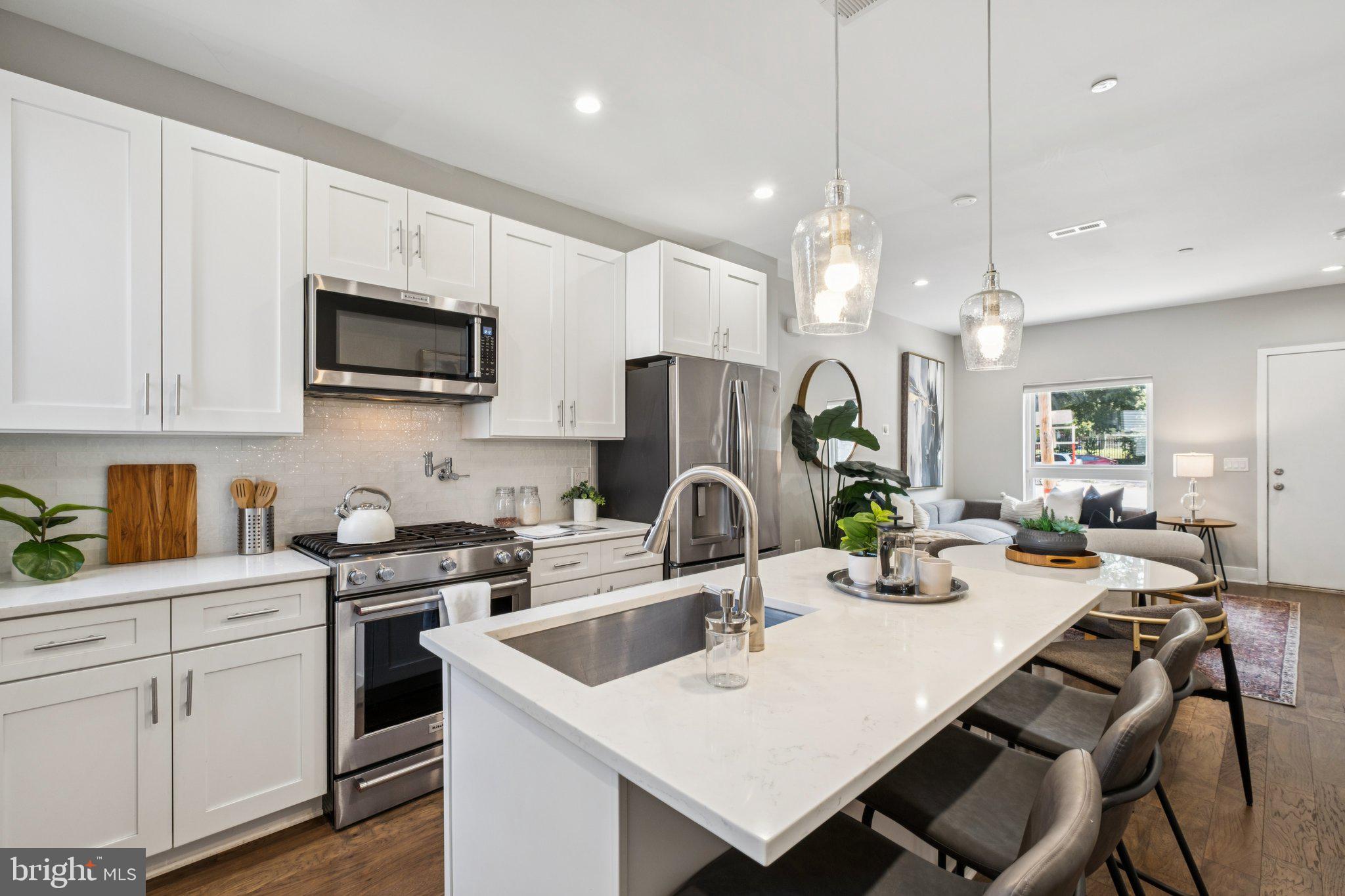 Never worry about parking again! This contemporary, single-family home in the heart of Brewerytown is located across N. Etting Street from a city-owned parking lot.
Upon entering, you'll be greeted by hardwood floors, a flood of natural light, and an open and inviting living area that seamlessly connects to the kitchen. The kitchen features soft-close cabinets, sleek countertops, and stainless steel appliances, ideal for culinary enthusiasts and entertainers alike.
This home offers four generously sized bedrooms, providing plenty of room for relaxation and privacy. The primary suite features a spa-like bathroom equipped with custom tiles and a designer rainfall shower, offering a perfect retreat after a long day.
With three full bathrooms, morning routines for the entire household are a breeze. The finished basement provides additional living space, perfect for a home office, gym, or recreation room.
Step outside to your private backyard - a serene space for outdoor activities or simply enjoying a quiet moment. For those who love city views, the roof deck offers a spectacular skyline vista, ideal for entertaining or unwinding.
Located across from Athletic Square Park, this home provides easy access to recreational facilities and local amenities. Also around the corner are Brewerytown Garden, Together Skateboarding & Cafe, and Human Robot. Approximately four (4) years remaining on the property tax abatement.
Visit an open house this weekend or schedule your private showing today!