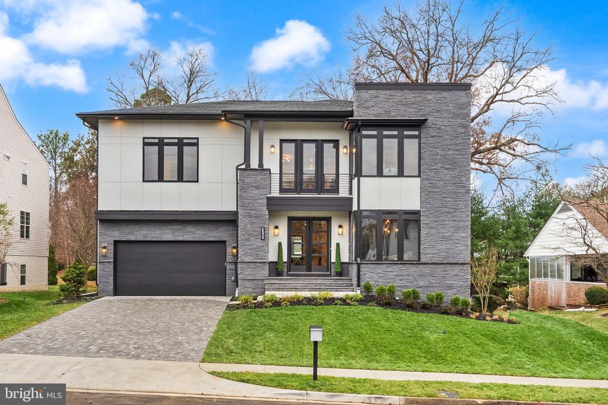 NEW CONSTRUCTION - IMMEDIATE DELIVERY:

The Avalon E-Series on Fairlawn Drive is a home designed for those who value intentional architecture, refined comfort, and elevated everyday living. Its contemporary profile—defined by low-pitched rooflines, a parapet silhouette, and an exquisite stone façade—creates an immediate sense of presence, enhanced by oversized black casement windows that flood the interior with natural light.
Beyond the grand double doors of the foyer, the study sits to the right behind striking steel-and-glass doors, setting a sophisticated tone for the home’s craftsmanship and design. The main level unfolds with custom millwork, curated lighting, and an expansive Family Room anchored by an oversized linear fireplace, creating a warm and welcoming place to gather.
The kitchen serves as the true heart of the home—equally suited to relaxed family moments or elevated entertaining. It features natural wood cabinetry at the island, a sculptural quartz waterfall countertop, crisp white perimeter cabinetry, a 48” range and 48” built-in refrigerator/freezer. A fully enclosed prep kitchen with its own sink and under-counter appliances offers enhanced function and privacy. The Morning Room and covered outdoor living space extend the home’s rhythm into the outdoors, creating spaces to unwind and enjoy the setting.
Upstairs, a thoughtfully designed loft with built-ins provides an additional living area ideal for work, homework, reading, or retreat. All secondary bedrooms enjoy private en-suite baths. The Owner’s Suite feels like a private sanctuary with its beamed ceiling, fully customized walk-in closet, and spa-inspired bath featuring a freestanding soaking tub and zero-threshold shower. A private rooftop terrace extends the suite outdoors, while a second terrace off the loft offers its own quiet escape.
The finished lower level enhances the home’s livability with a color-drenched, pre-wired media room complete with platform seating, a sleek wet bar, a dedicated gym with a built-in water bottle filler, and an additional bedroom and bath. A flat, usable yard, paver driveway, mudroom built-ins, and 9’ basement ceilings complete this exceptional offering.
Set on a quiet, established street in McLean, this home blends architectural distinction with modern ease—close to top schools, major routes, and the best of Northern Virginia living.

EVERGREENE QUALITY: 
Every Evergreene home is thoughtfully crafted with features designed for long-term comfort and peace of mind. Behind the walls of the Avalon additional features include whole-house ventilation, humidifier, electronic air cleaner, abundant recessed lighting, upgraded 2x6 framing, superior thermal insulation, and a best-in-class 10-year transferable builder’s warranty.

Floor plans and images are for illustrative purposes only; certain features may reflect upgrades or options not included in the base price.
 
Contact us today to learn more about this unique opportunity.