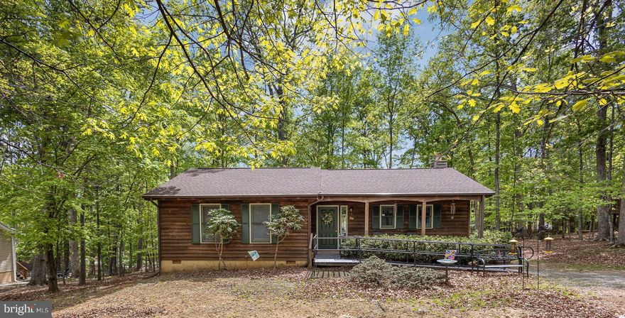 Lake Life Just Steps Away!

Welcome home to 23 West Lake Forest Drive, a charming 3-bedroom, 1-bath retreat tucked inside the vibrant Lake Monticello community! Imagine starting your mornings with coffee on your peaceful front sitting porch and ending your evenings with a barefoot stroll down to Beach 3 — just a short walk from your front door. Feel the warm sand between your toes, the cool breeze off the lake, and the sun setting over the water — all just minutes away without ever getting in the car.

Inside, you'll find a cozy layout ready for your personal touch, while outside, a private back deck invites summer BBQs, lazy afternoons, and good times with friends and family. Plus, enjoy peace of mind with a new roof installed in 2021.

Living here means more than just a house — it’s a lifestyle. Lake Monticello offers a 350-acre lake for boating, fishing, and swimming, five beaches, a full-service marina, an 18-hole golf course, two clubhouses, a community pool, parks, playgrounds, basketball courts, racquet sports, and even onsite dining at Lakeside Restaurant and The Pub.

Whether you’re searching for a weekend getaway, a first home, or your new everyday oasis, this sweet spot is the perfect starting point for your next adventure. Come see it for yourself — and don't forget to bring your flip-flops!

Front ramp is for sale or will be removed prior to closing.