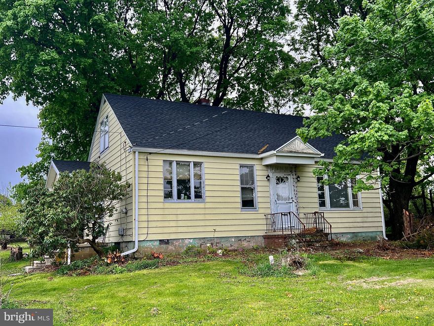 You can start your homesteading adventure in this rural location outside of Barnesville.  The home, a Cape Cod style, is going to take some elbow grease to make your own. But look at all that potential. There are two bedrooms, bath, living room, dining room, kitchen and enclosed porch on the first floor. The second floor is finished and unheated, so you can use as storage or turn into two more bedrooms. The home sits on 1.6 acres and has a large 2-story, oversized 2-car garage with large, attached building. The grounds were used as  a poultry farm in the past and the structures are still there. Make an investment in your future and take a look at this property today. Items remaining at the property will not be removed for settlement.