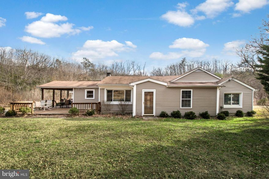 No HOA, very private backyard sitting on 3 mostly wooded acres. It has been recently renovated, new septic system, new Kitchen, Open Floor, huge wrap around deck. Enjoy the Spacious Master Bedroom with a High Ceiling, sitting area and soaking tub, owners pride throughout the house, it is very well kept, 4th bedroom NTC, new heating system in 2014, close to RT 1 and I95, Home Warranty.